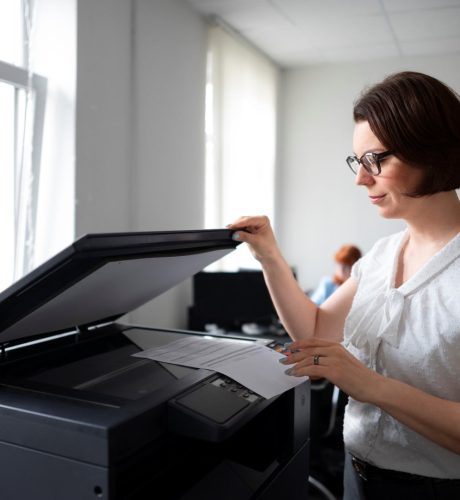 woman-working-office-using-printer (Large)